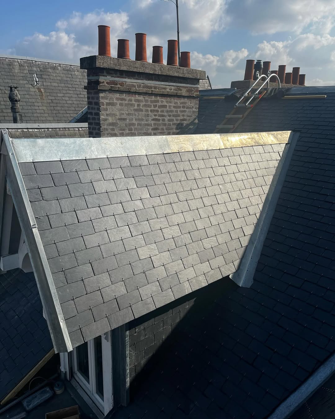 Réfection d'une toiture et préparation de la nouvelle couverture
